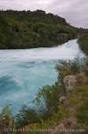 The Waikato River (usually 100 metres across) squeezes through a narrow canyon 15 metres across creating the Huka Falls near the town of Taupo, North Island, New Zealand.