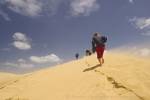 A trail of footprints are left by people climbing to the top of the Te Paki Sanddunes in Northland, New Zealand.