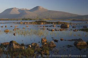 A serene sunrise over the landscape of Rannoch Moor Near Fort William in Scotland, Europe.